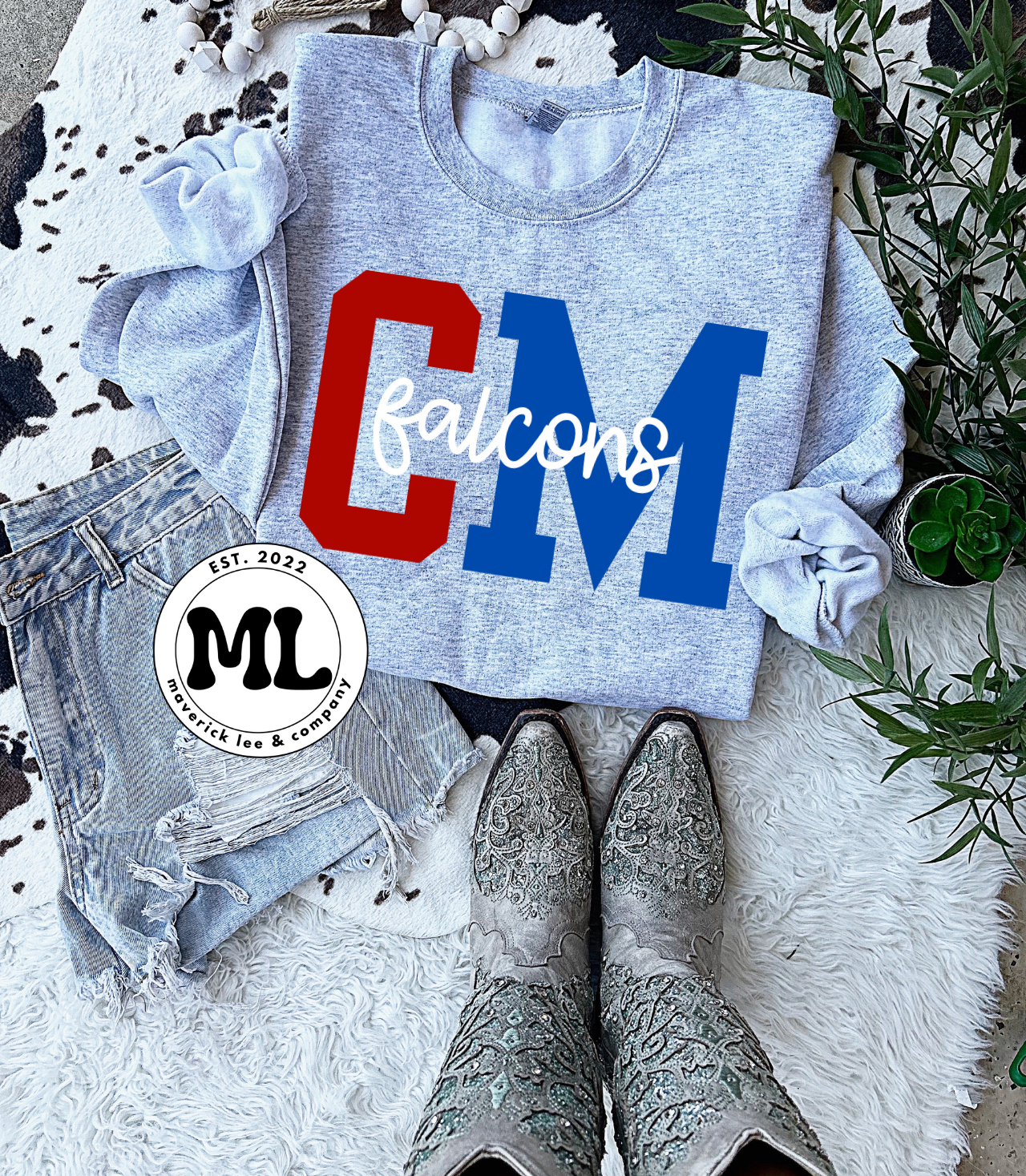 Clinton-Massie duo color Varsity + Mascot