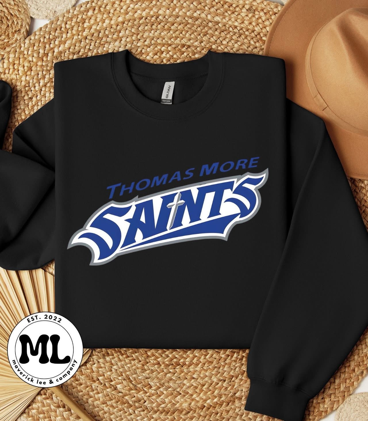 TMU saints logo