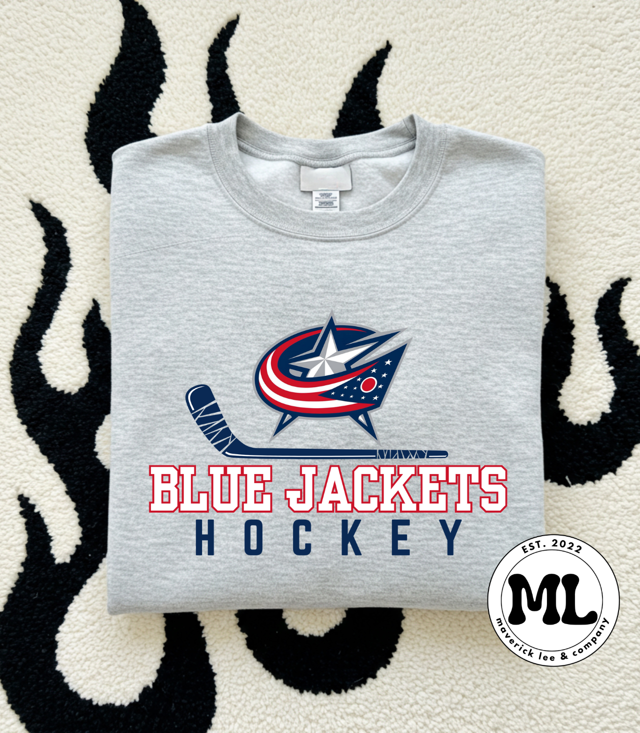 Blue jackets hockey with stick