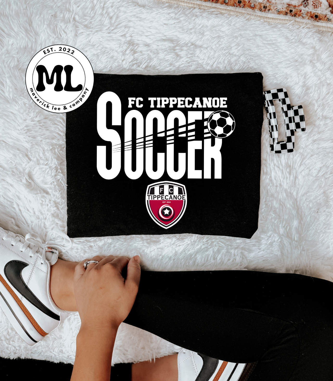 FC Tippecanoe white with kicked ball