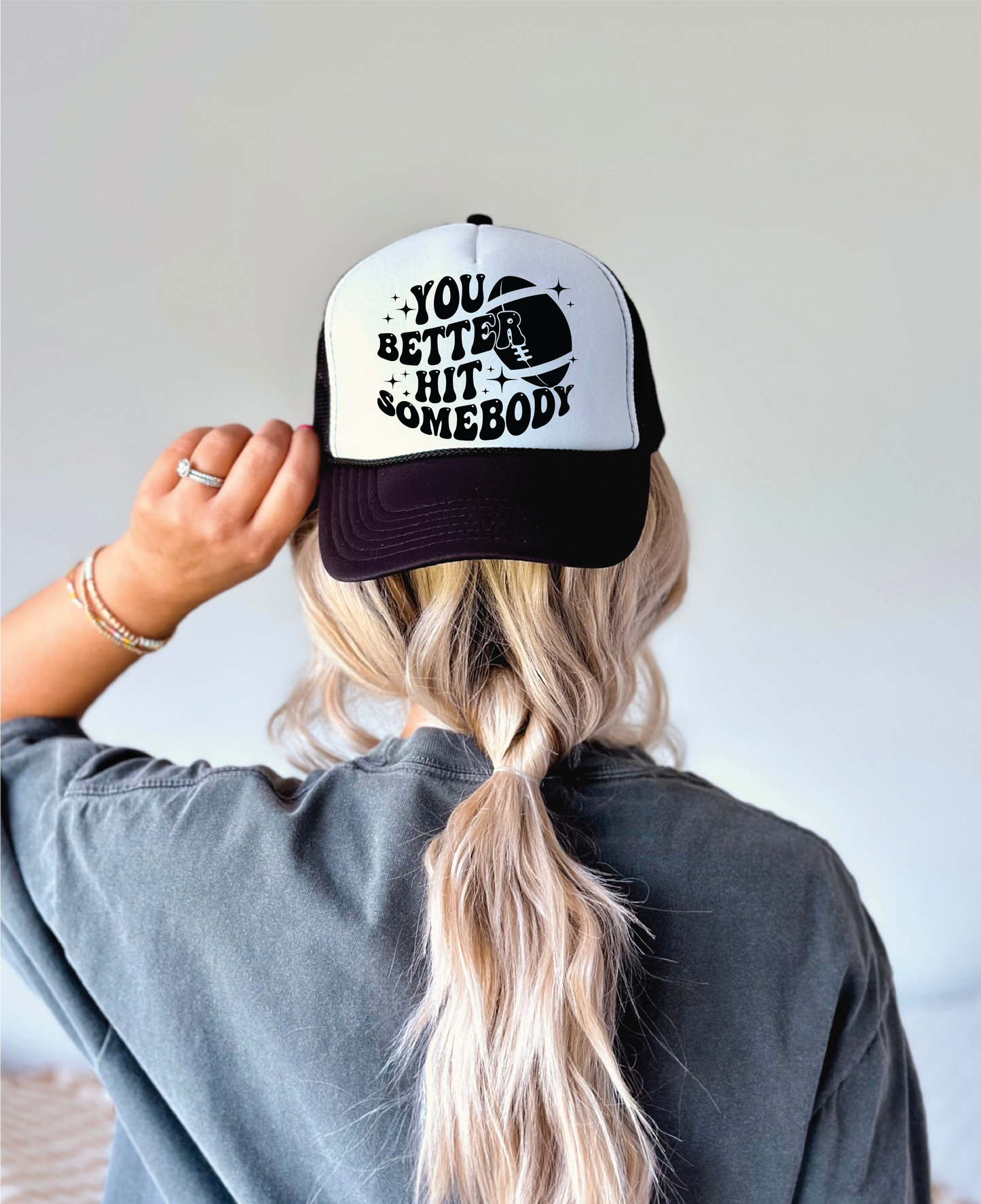 You Better Hit Somebody Football DTF Printed Black And White Trucker Hat
