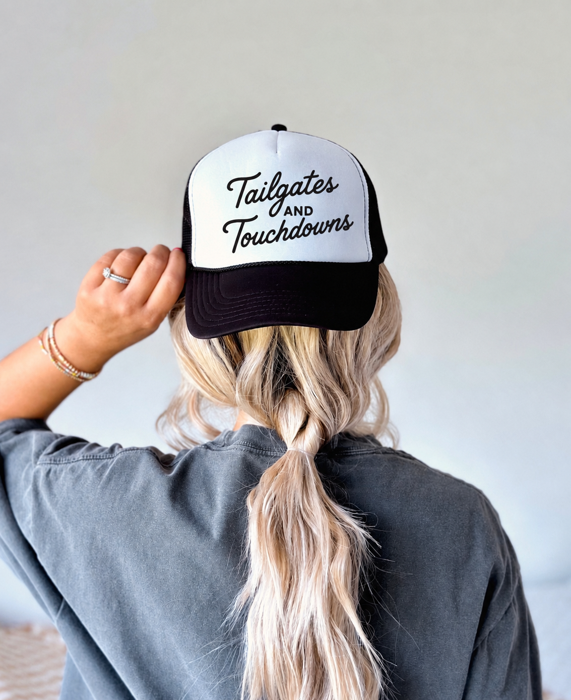 Tailgates and Touchdowns- UNISEX BLACK and White Trucker Hat