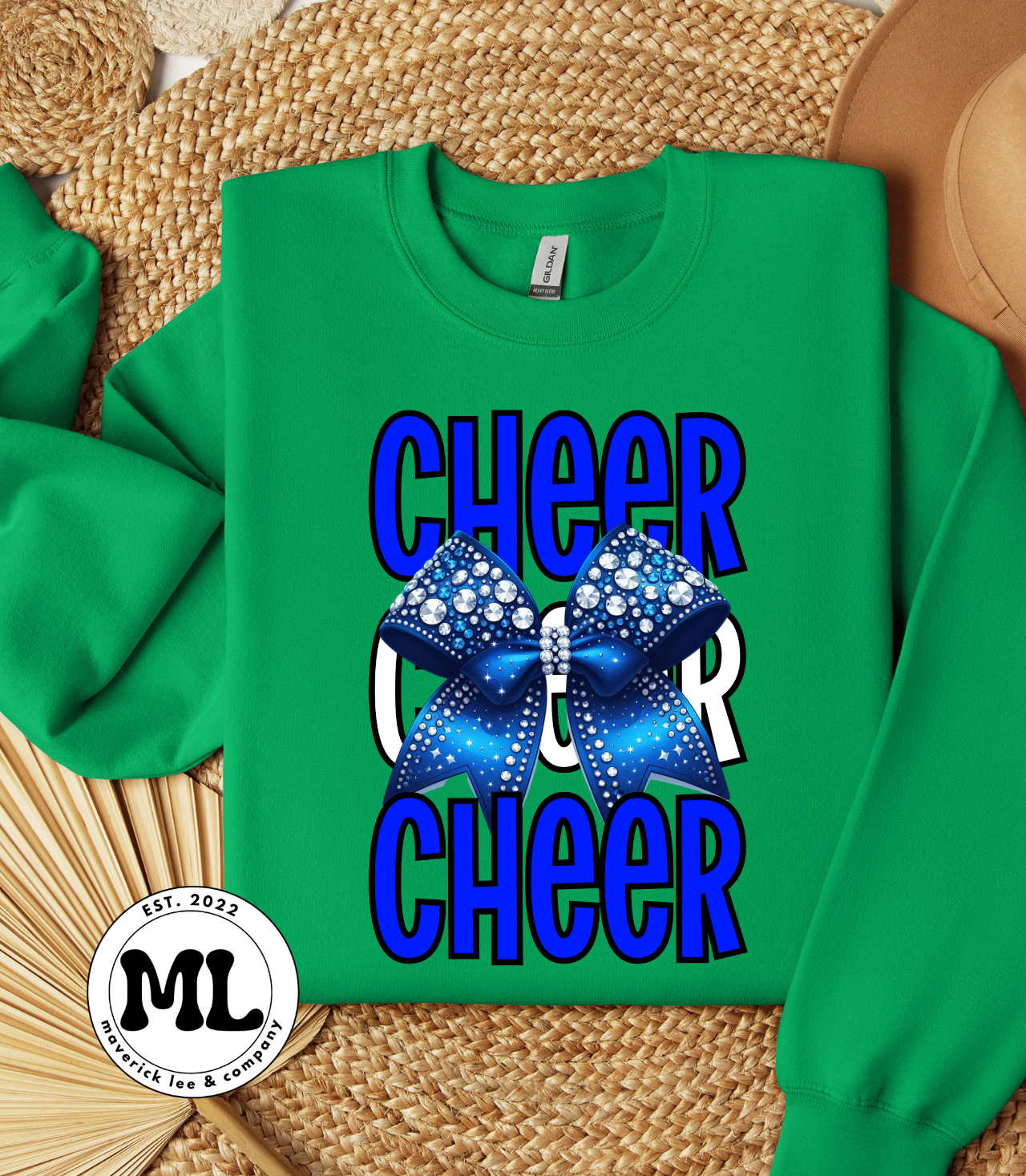 Scrolling, royal blue rhinestone bow cheer