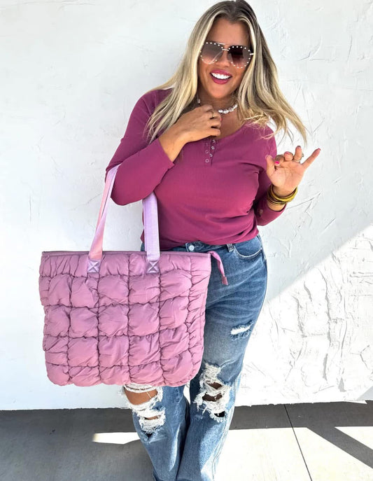 Mauve puffer bag in stock