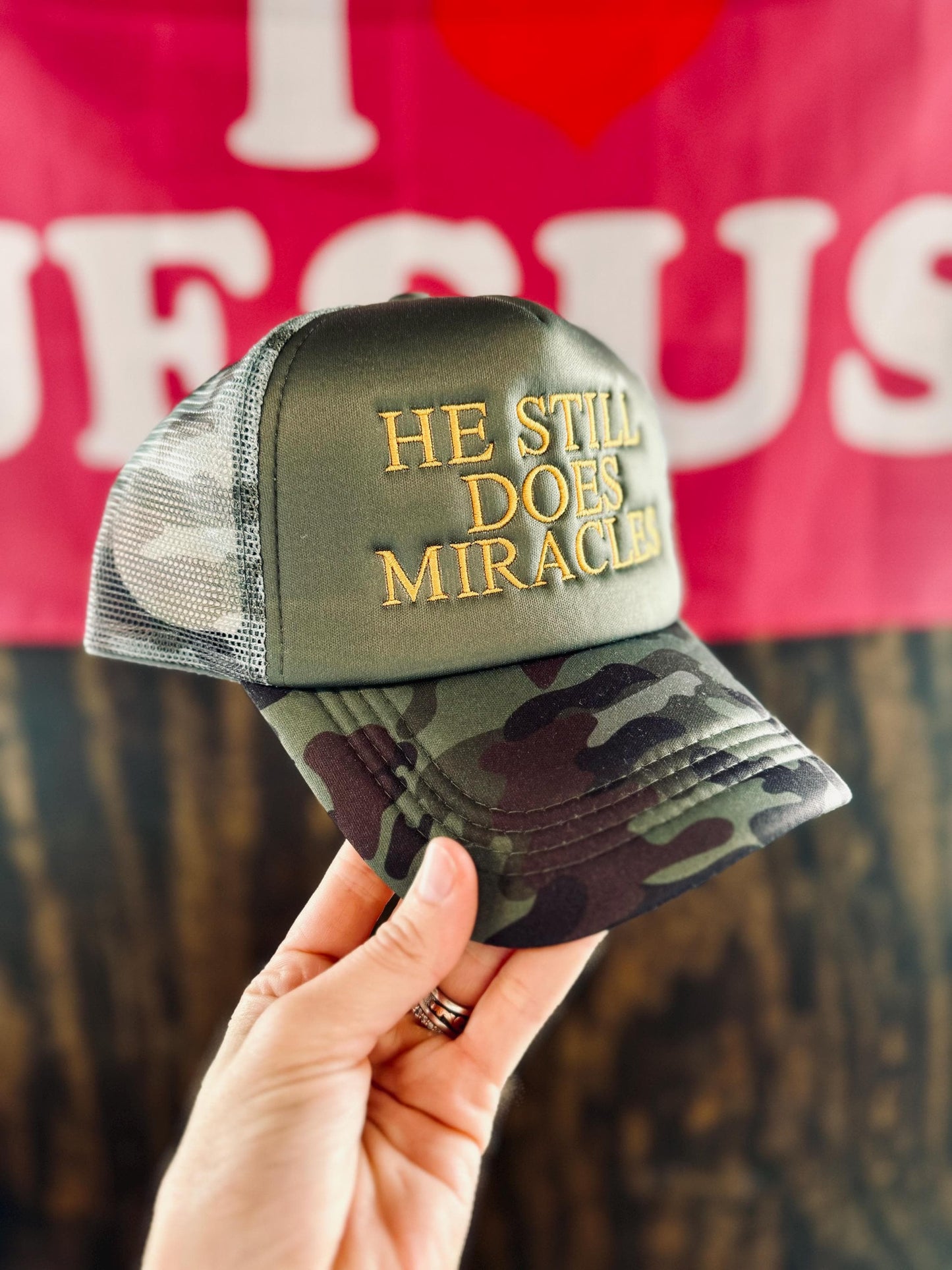 He Still Does Miracles Embroidered Trucker Hat