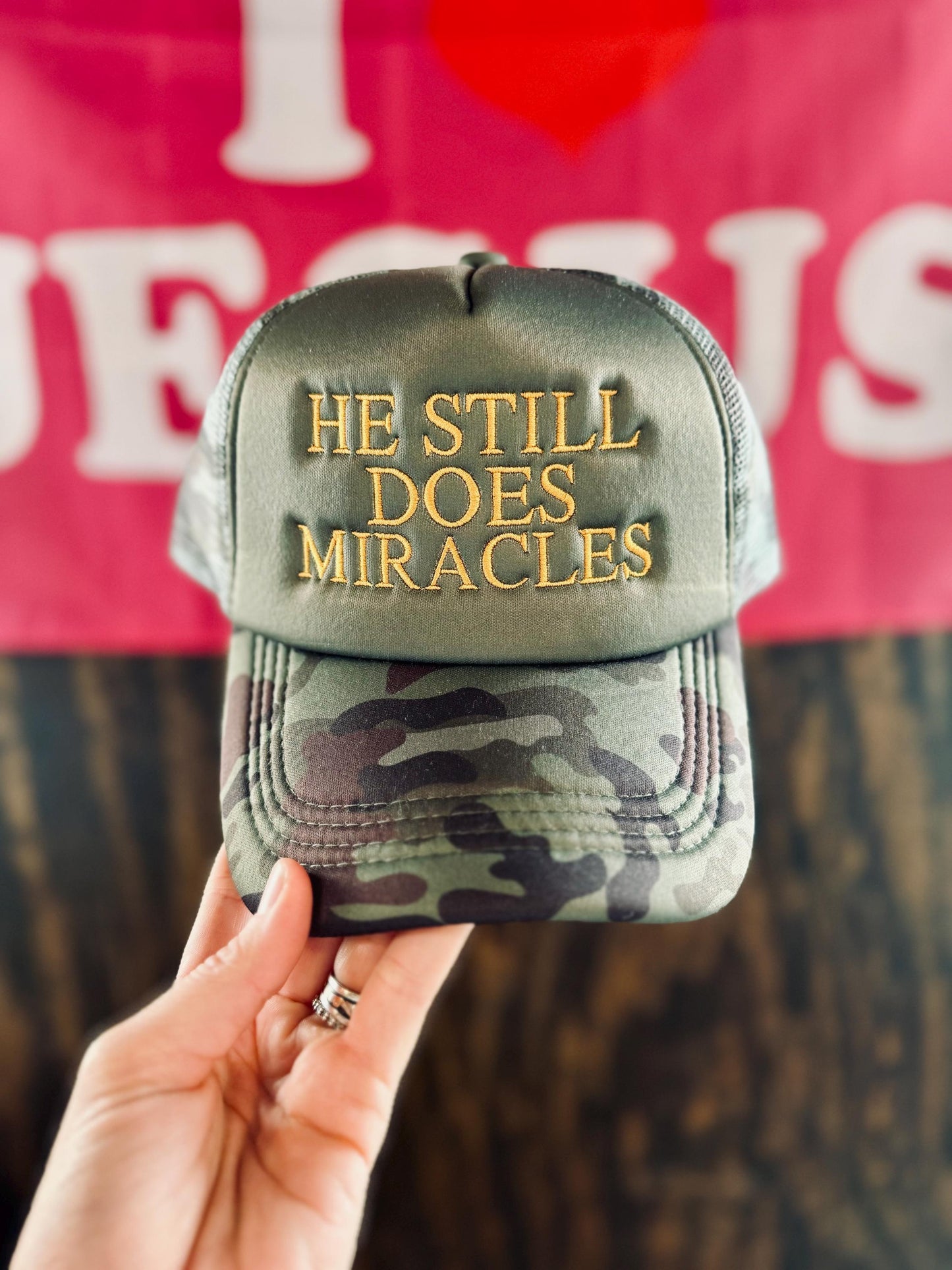 He Still Does Miracles Embroidered Trucker Hat